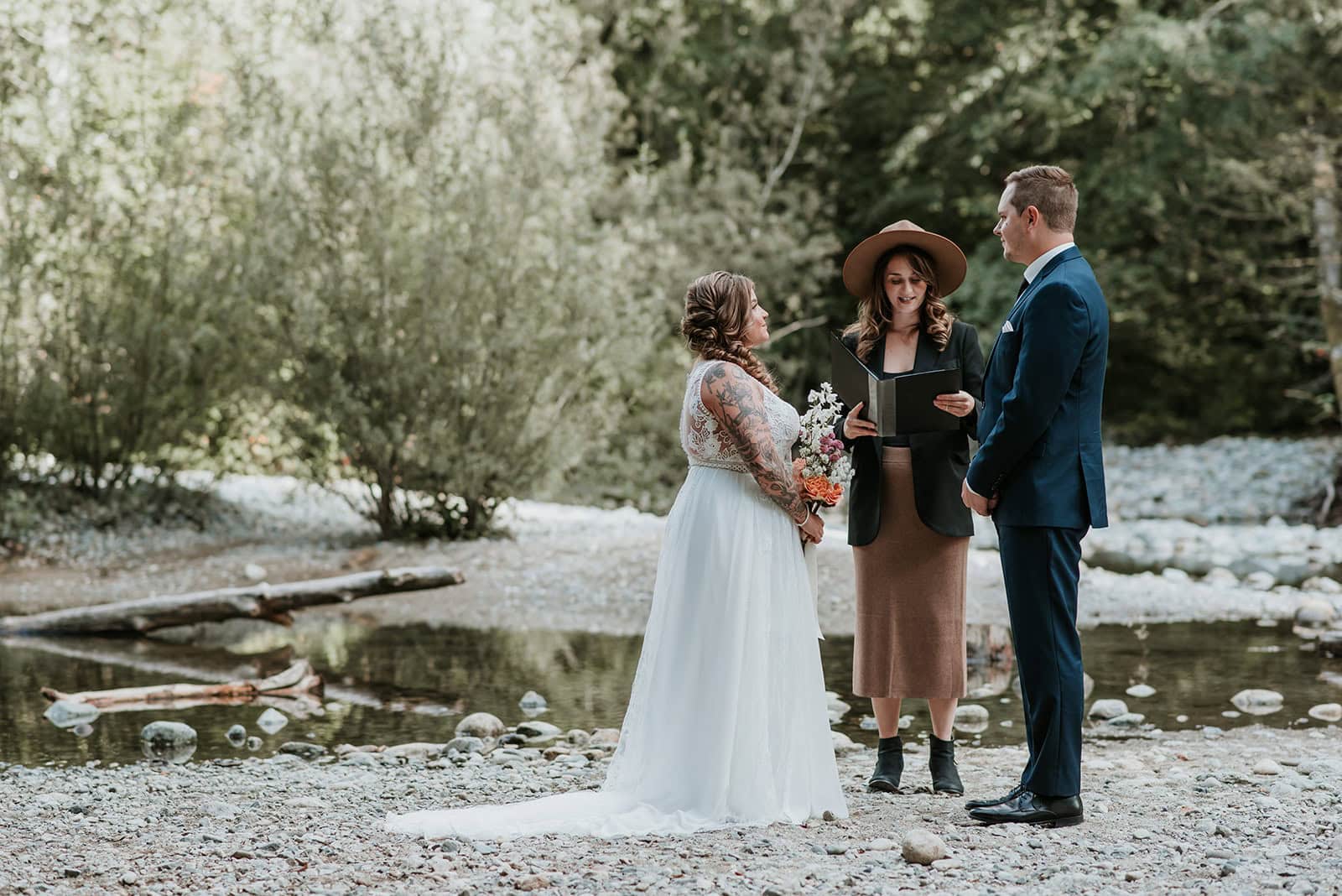 Squamish elopement photographer documents an intimate wedding next to a river