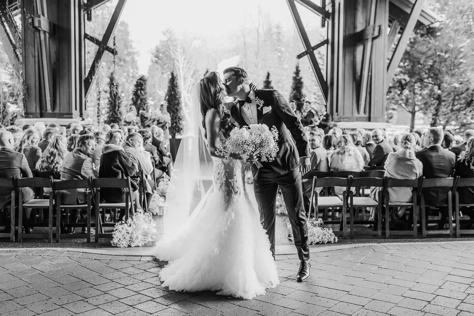 Bride and Groom walk up the aisle after their wedding ceremony at Nita Lake Lodg