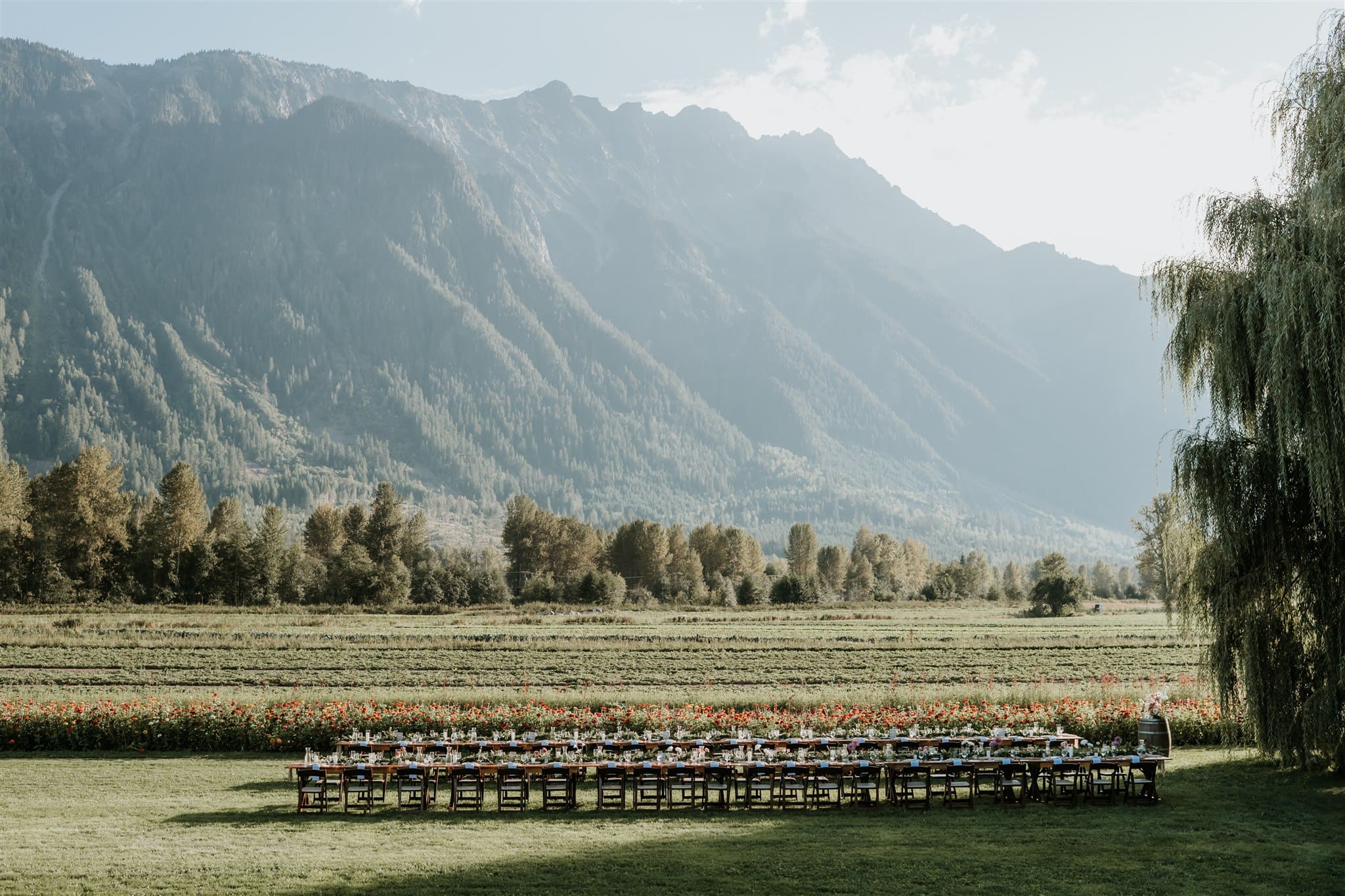 Pemberton wedding venue North Arm Farm has stunning mountain views for a long table dinner